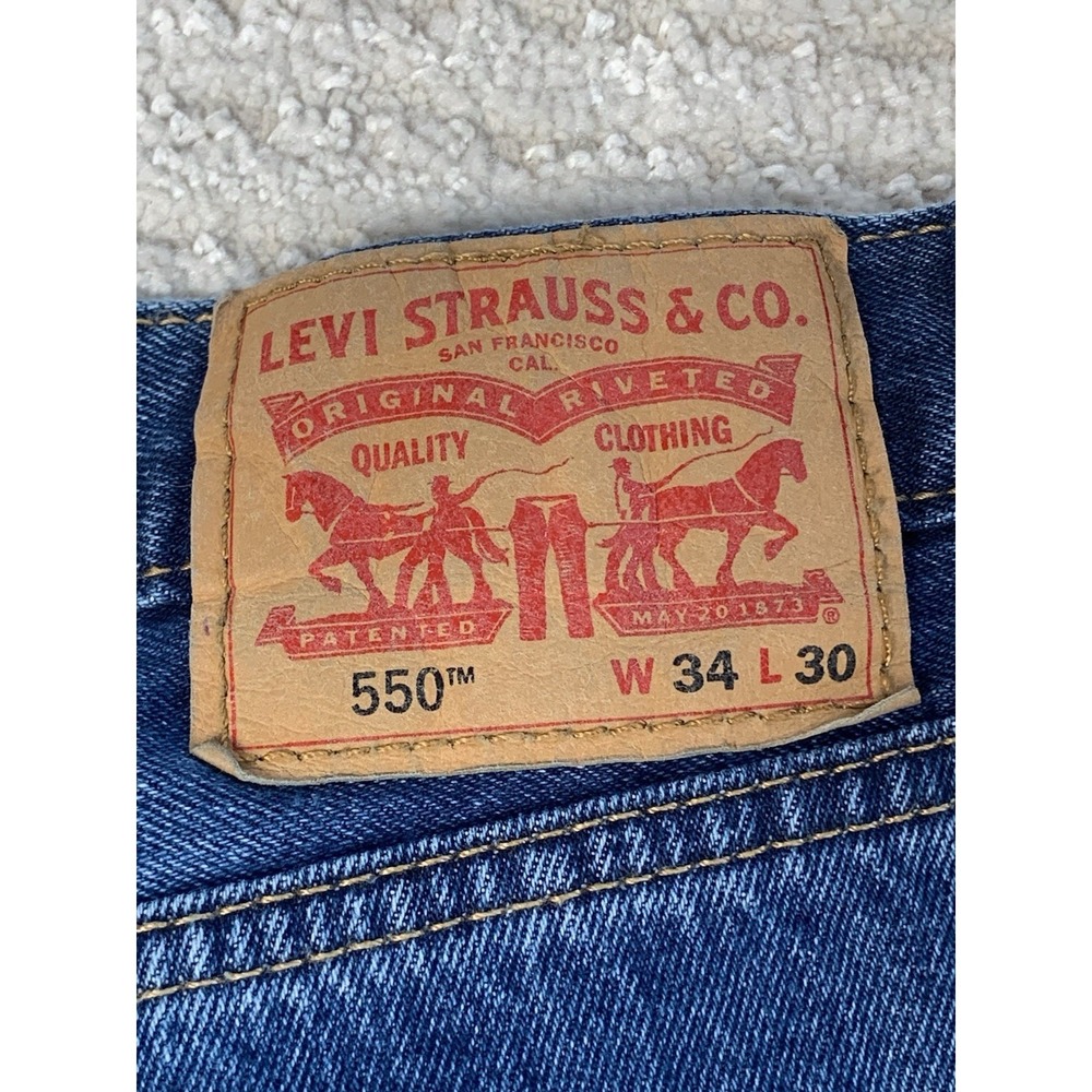 Levis 550 Men's Relaxed Tapered Jeans Vintage Y2K size 34x30 Blue Medium Wash - Picture 9 of 14